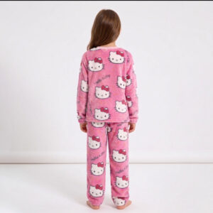 Girl wearing sherbet pink Hello Kitty childrens pyjamas with oversized white Kitty face print